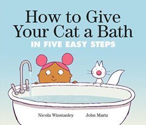 Cover of the picture book How to Give Your Cat a Bath in Five Easy Steps. A girl with afro puffs and a white cat look over the edge of a bathtub filled with water. 