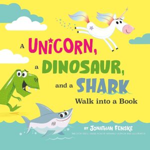 Cover of the picture book A Unicorn, a Dinosaur and a Shark Walk Into a Book. Yellow with cartoon images of the three main characters. 